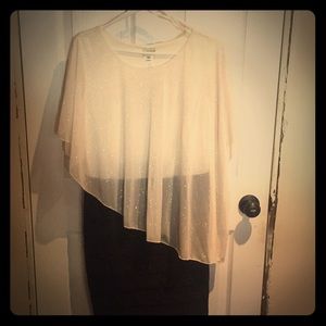 A beautiful cream and black dress